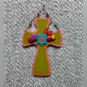 Ceramic wall hanging decorative cross.
